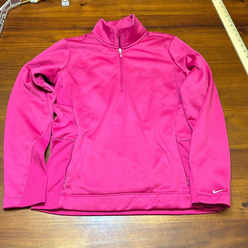Women’s Nike Golf Tour Performance Therma-Fit 1/4 zip sweatshirt in pink size M